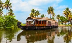 A houseboat sailing in Alappuzha backwaters in Kerala state in India